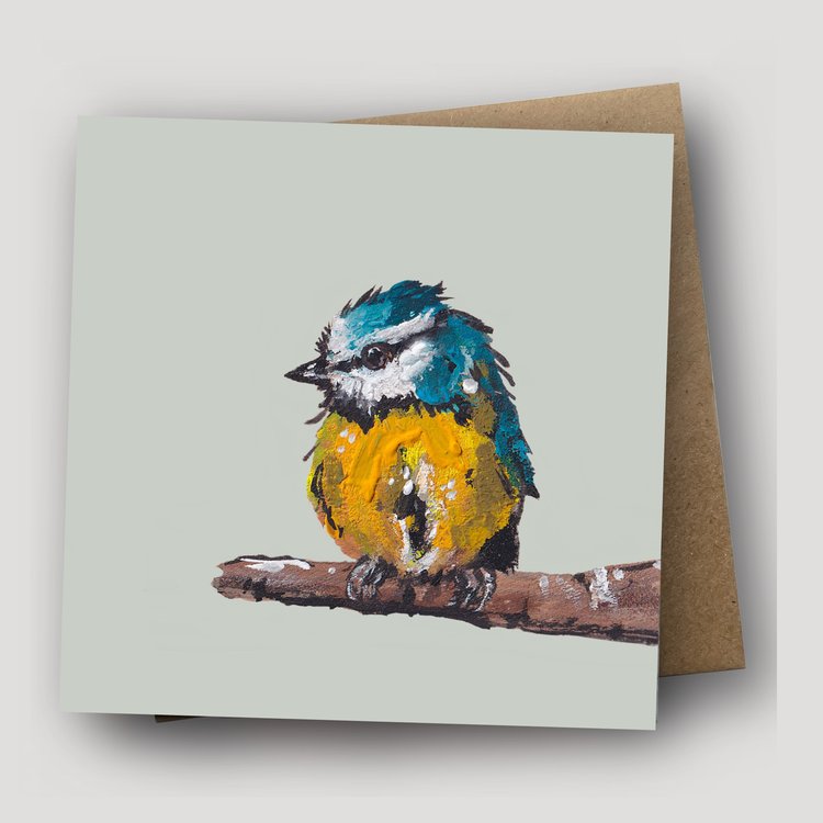 Square greetings cards with a blue tit illustration and a kraft envelope behind.