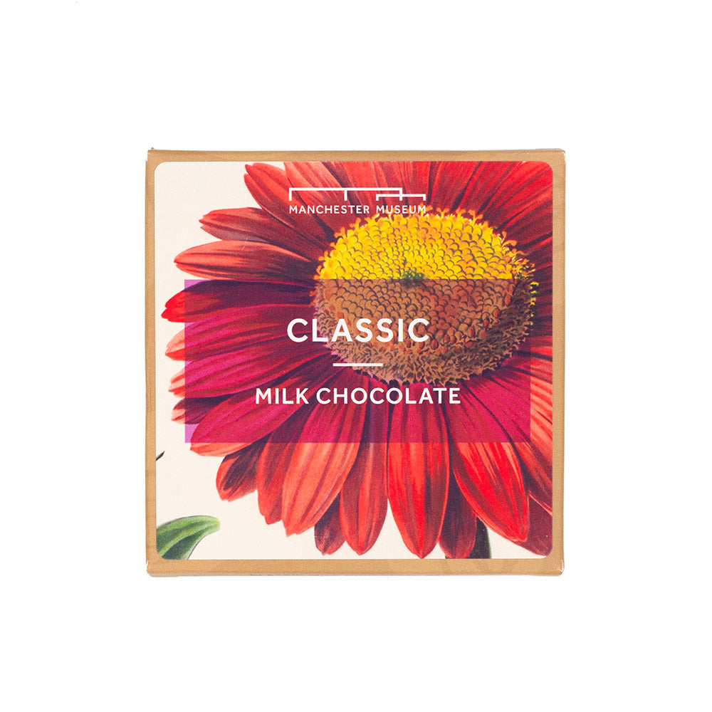 Classic milk chocolate squared packaging with large print of a close up of a red flower.