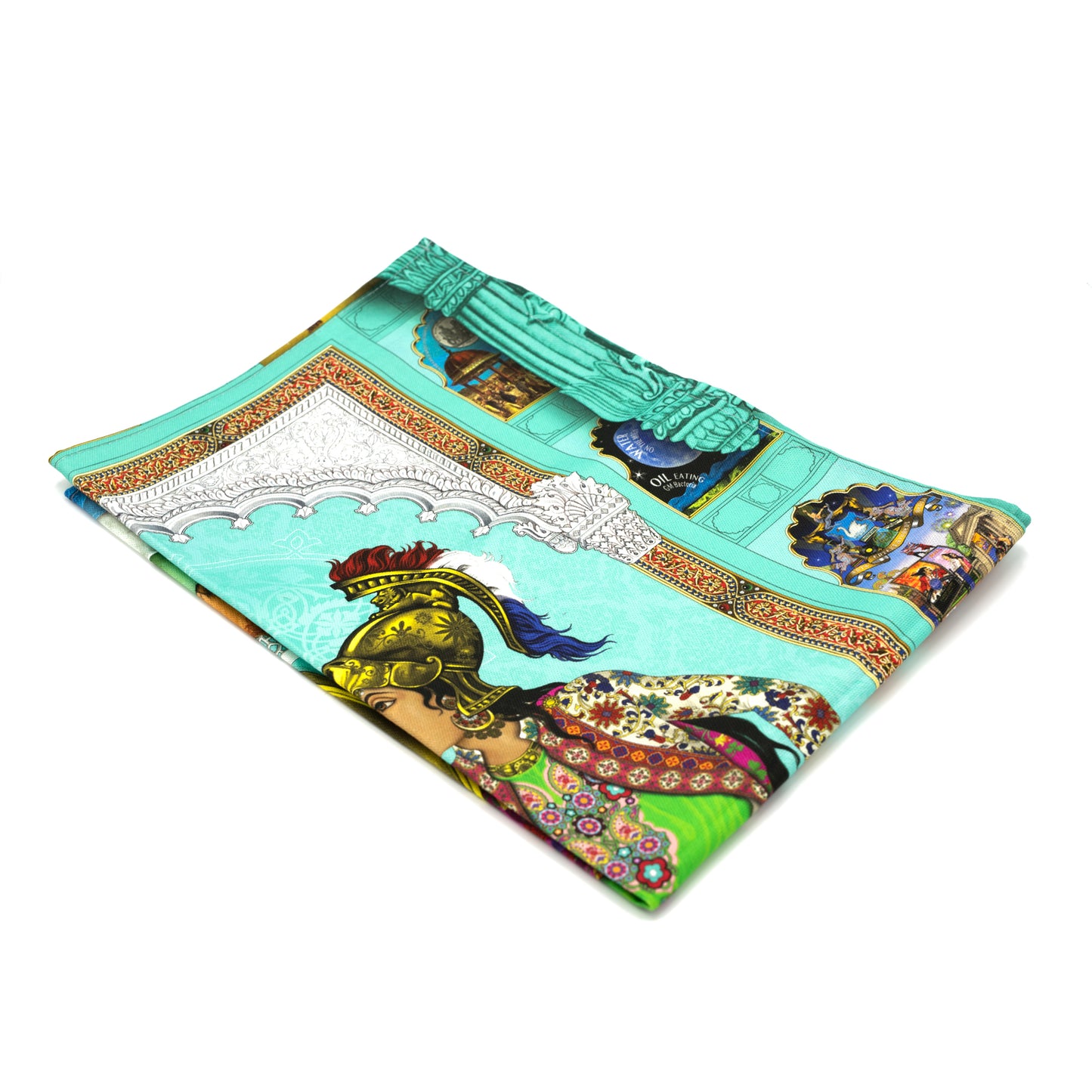 Singh Twins Brittasia design tea towel, folded into 1 quarter.. Blue background and person sat in a wheelchair with the British flag for the wheel.