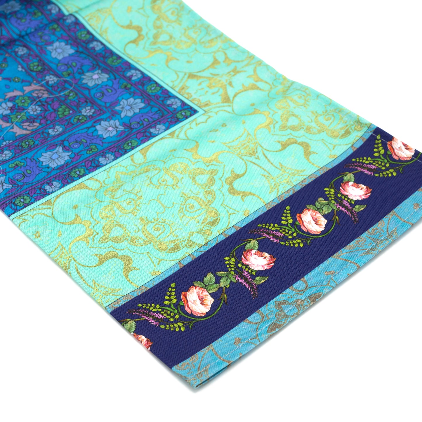 Tea Towel featuring Singh Twins Knowledge Design - blue and gold pattern. Tea towel is folded into 1 quarter and photographed against a white background.