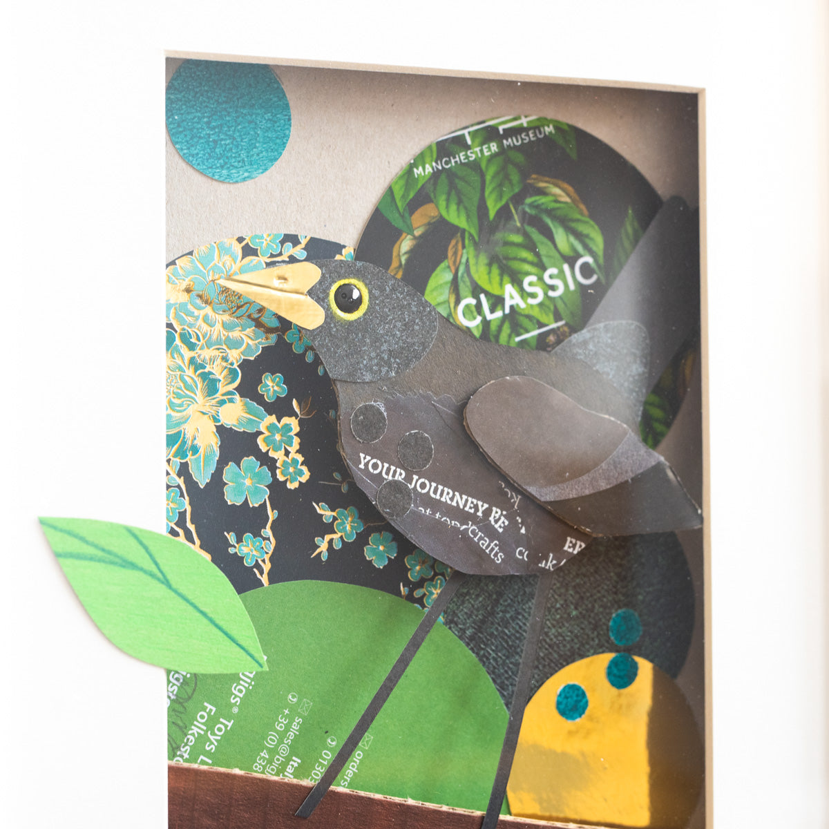 Close up of blackbird artwork.