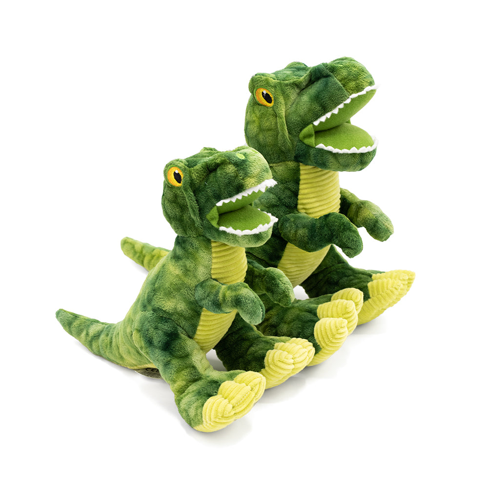 Two fabric toys in the shape of a T-Rex placed side-by-side in front of a white background.