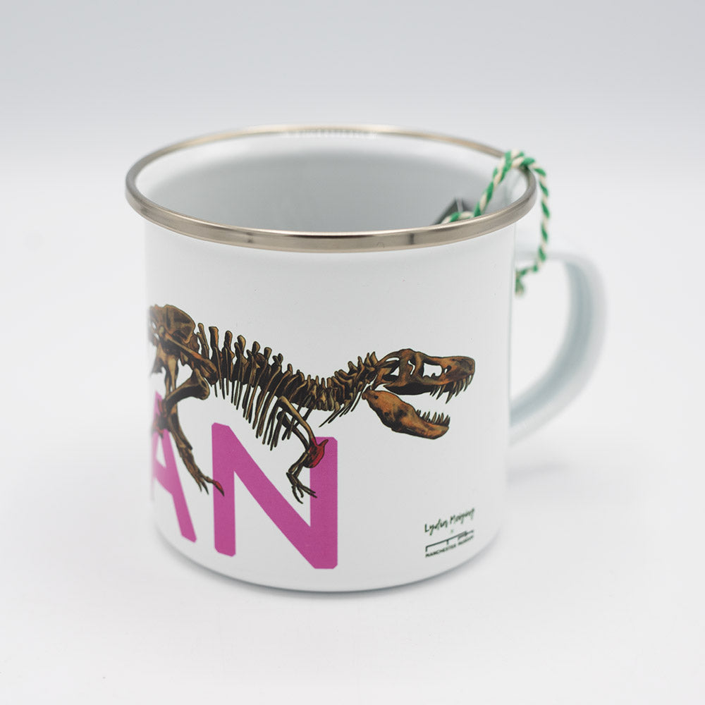 Enamel mug with dinosaur design and pink text on a white background