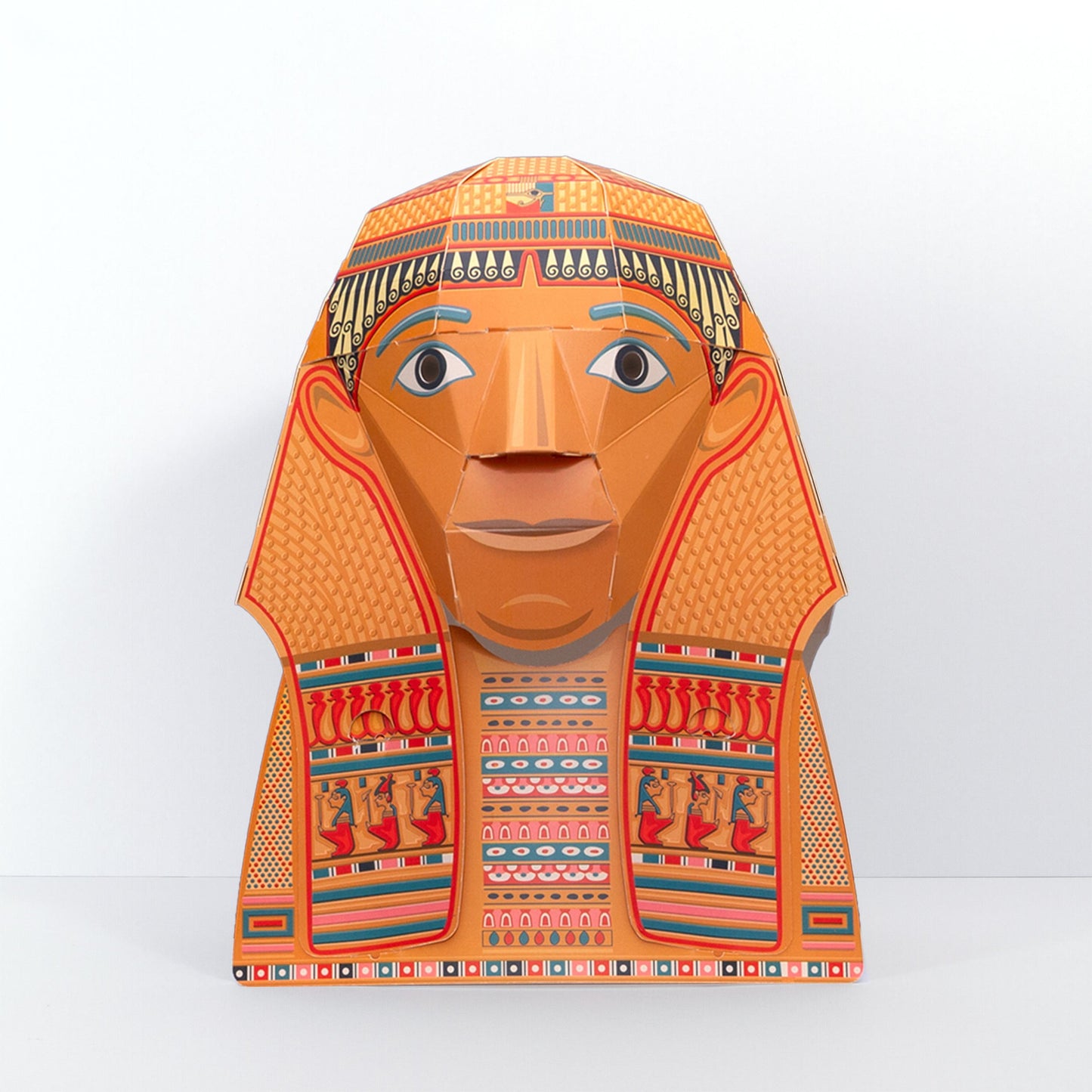 The assembled head mask which is golden, red and stone blue.