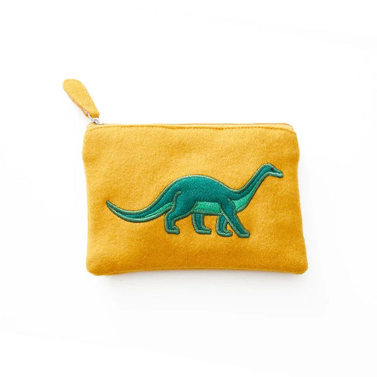 Orange felt purse with a green diplodocus embroidered on the front. White backdrop.