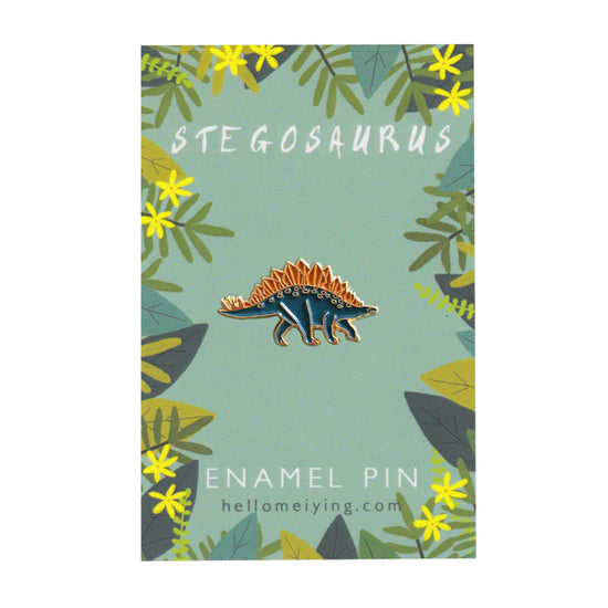 stegosaurus pin on the green backing card packaging,
