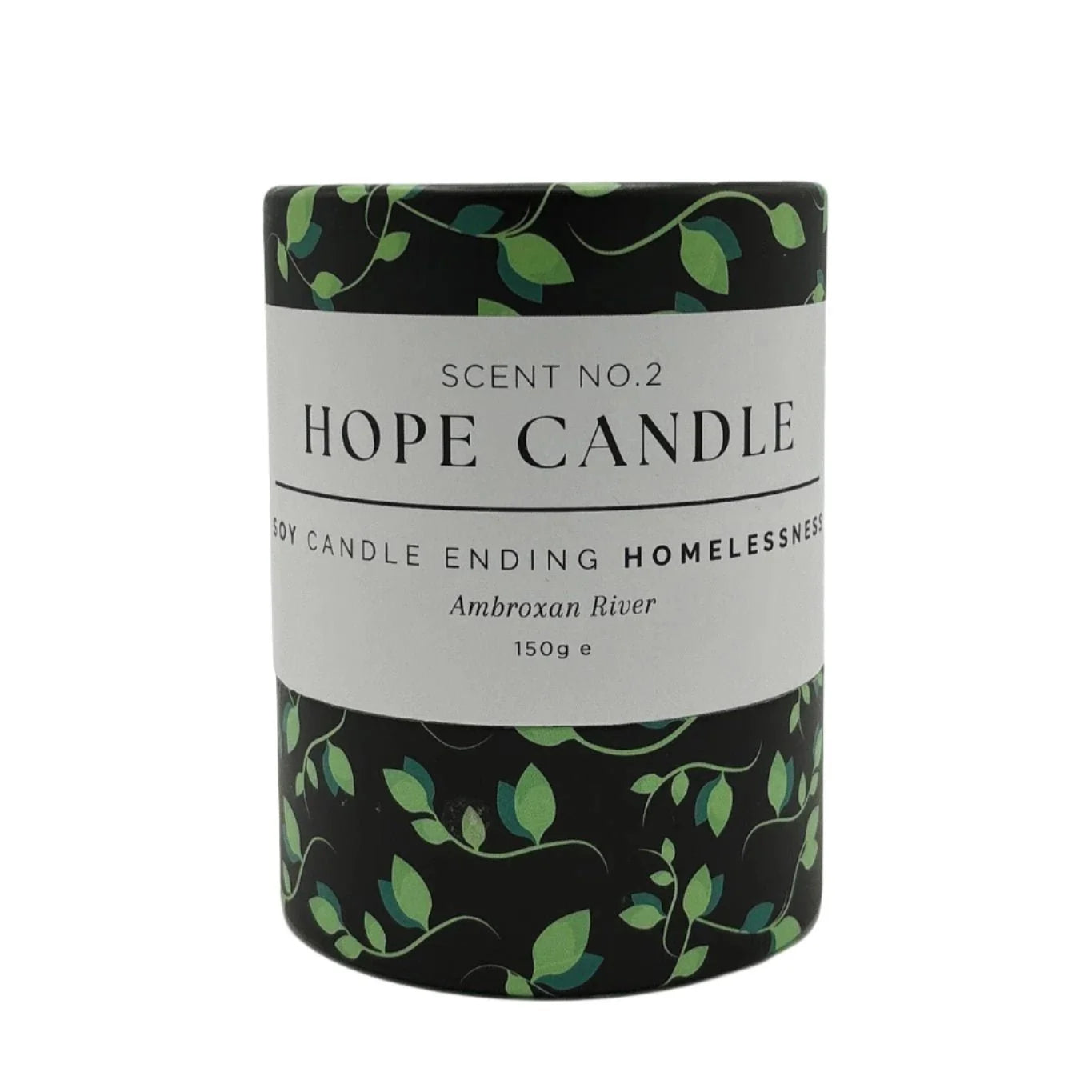 A black and green cylindrical candle container with text about the product, featuring a design of green leaves on a black background.