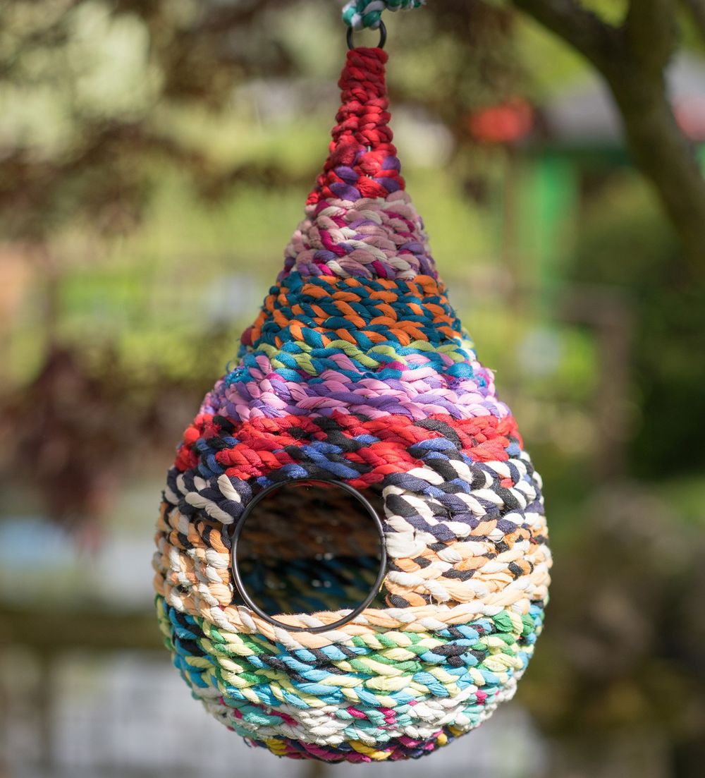 A lighter version of the colourful sari birdhouse with a side opening.
