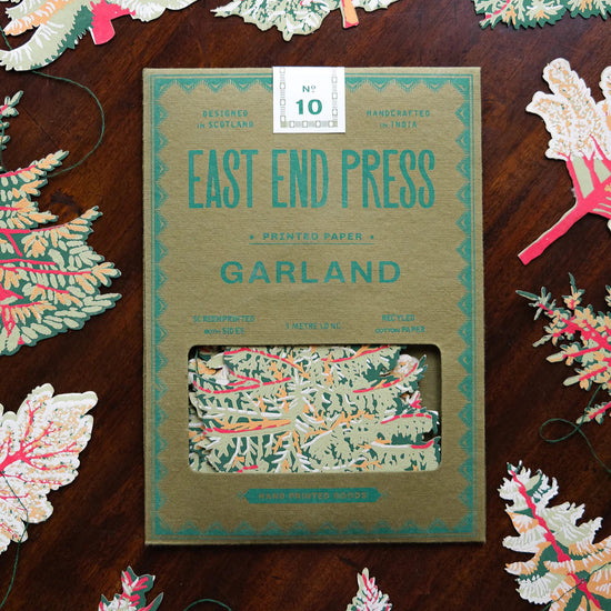 Green paper packaging of the tree garland.