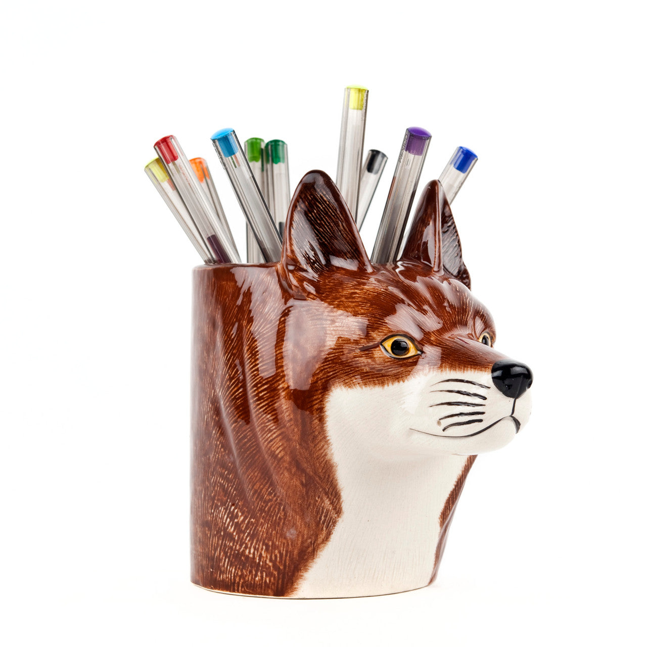 Fox pencil pot seen at an oblique angle with pencils in it.