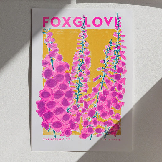 Orange and pink Risograph print featuring an illustration of a foxglove plant.