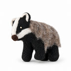Wool felt badger ornament featuring distinctive facial markings and a hanging loop.