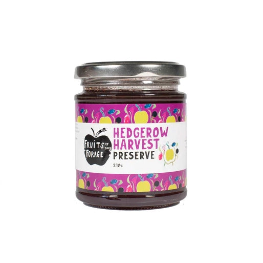 A glass jar of hedgerow harvest preserve. The label includes the Fruits of the Forage logo and a drawing of various hedgerow fruits.