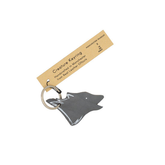 Leather keyring in the shape of a wolf - with a Hide Ranger label. 