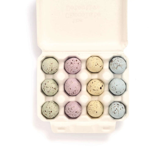 Open egg box showing twelve chocolate eggs in rows of speckled green, pink, yellow and blue.