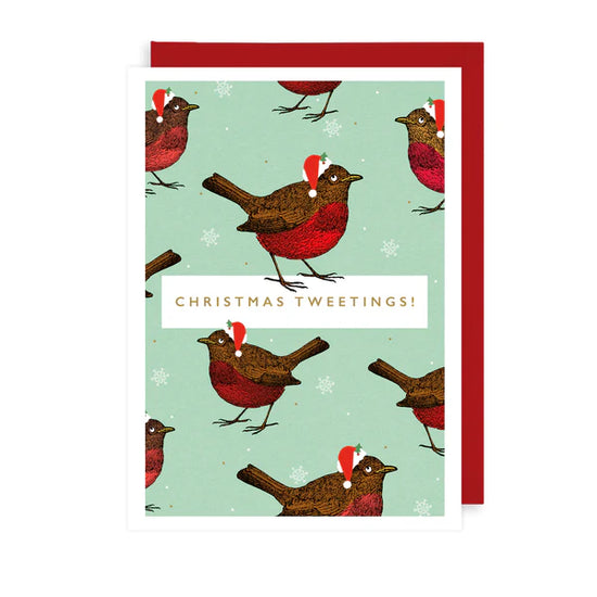 Greetings card featuring robin with Santa hat on