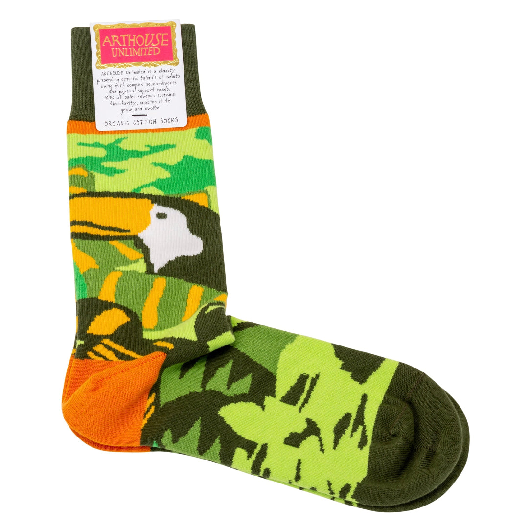 Side view of the socks in the card clasp packaging. The socks are shades of green from dark to lime green and have  black and white toucan with an orange bill on the side. The heel is orange.