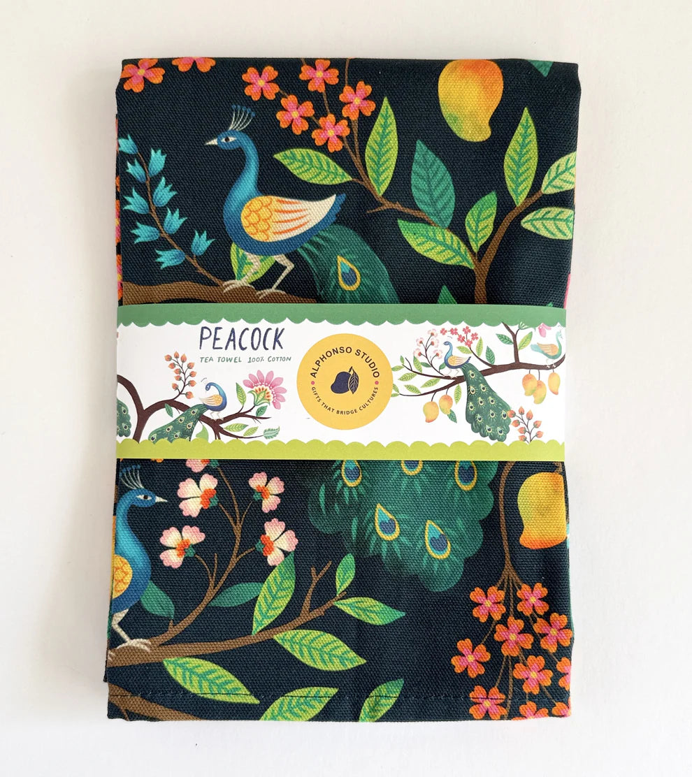 Tea Towel with peacock design and 'Alphonso Studio' paper bellyband against white background.
