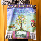 Tea Towel featuring Singh Twins Knowledge Design. A tree at the centre followed by illustration and photo montage.