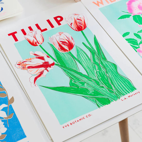 Green and red Risograph print of a tulip