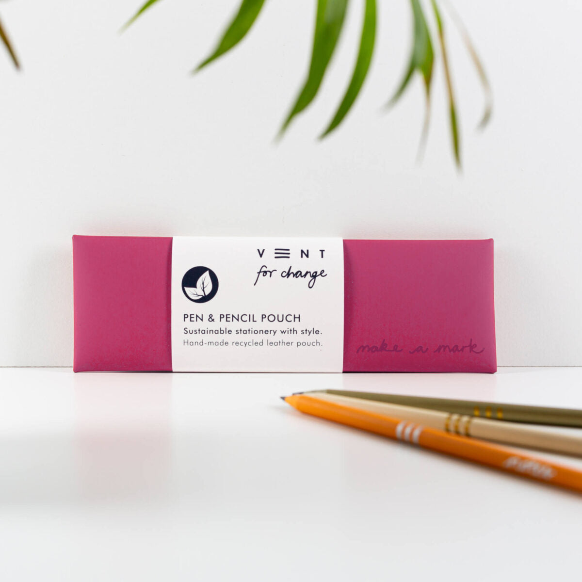 Pink pen and pencil pouch with a label on a white background