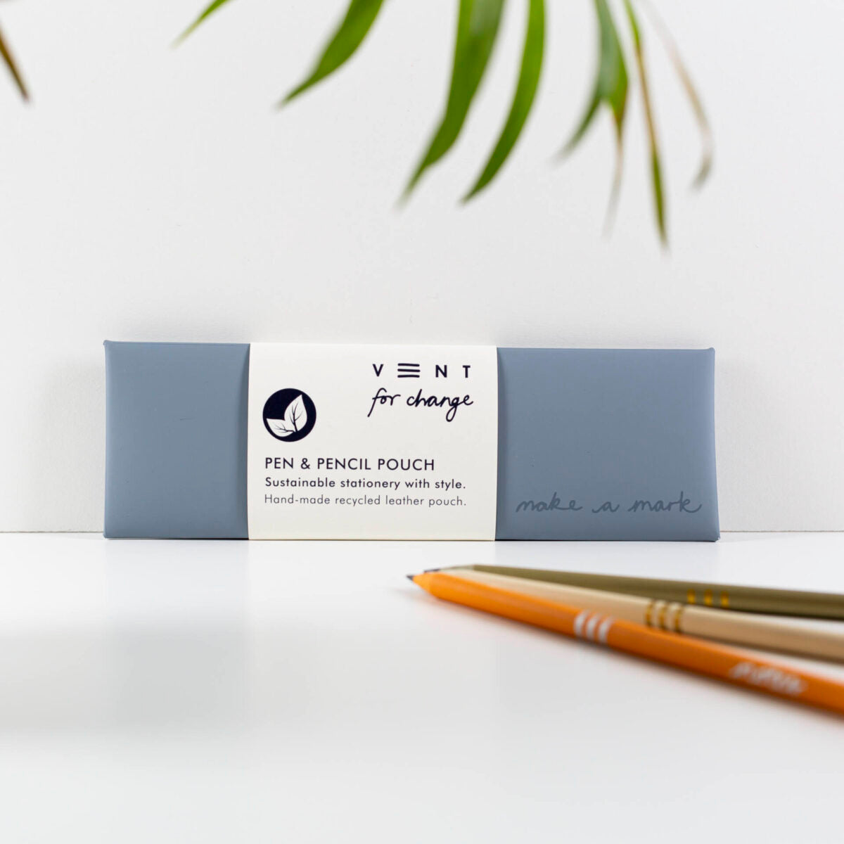 Pen and blue pencil pouch with pencils on a white background