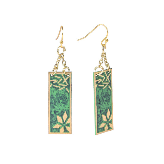 Green enamel earrings with a gold-toned frame and snowflake design.