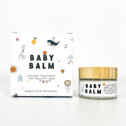 Load image into Gallery viewer, The box and the balm jar side by side. The jar is clear glass with a bamboo lid and a white label on the glass that matches the graphics on the box.
