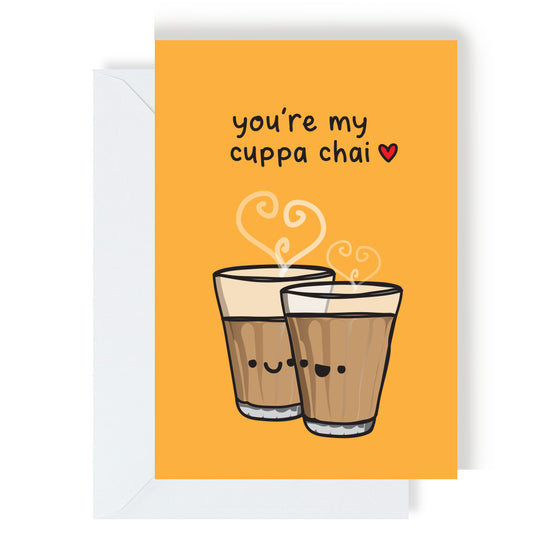 A greeting card with a bright yellow background featuring two cute, anthropomorphic chai tea cups with hearts above them. The text "You're my cuppa chai" is written in bold letters below the cups.