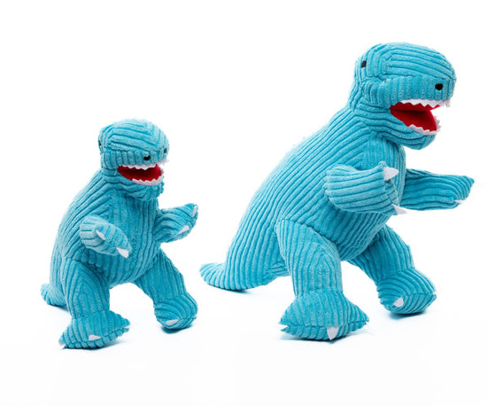 Two ice blue corduroy T rexes. The plush toy on the left is smaller than the one on the right.