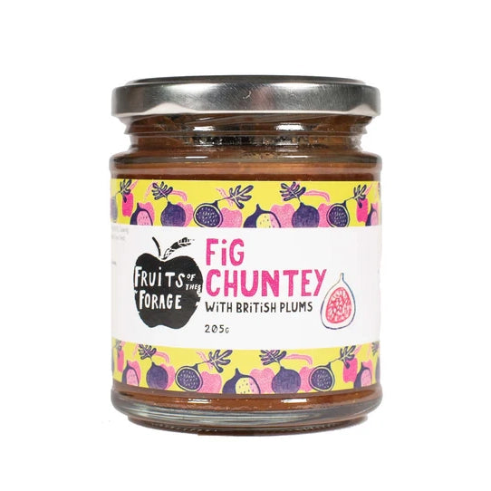 A glass jar of fig chutney with British plums. The label reads includes the Fruits of the Forage logo and a drawing of a fig.