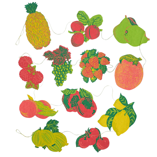 The fruits garland on a white bakground showing all of the fruits from pineapple through lemons to strawberries and grapes.