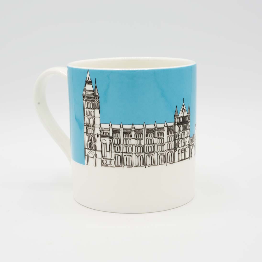 Blue and white mug with an illustration of Manchester Museum