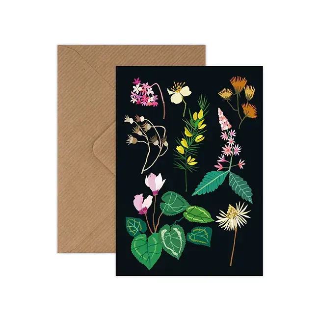 Black greetings card with winter flowers.