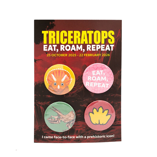 Badge set on a red and black branded backing card. White background.