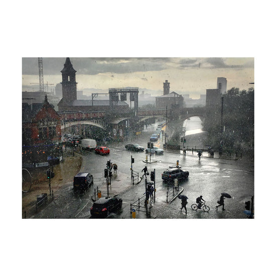 Load image into Gallery viewer, Simon Buckley of Not Quite Light, photography of a rainstorm by a traffic light near Deansgate. 
