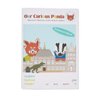 Our Curious Panda magazine cover, featuring an illustration of the Musuem and a badger, fox and dinosaur