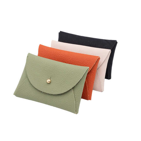 4 rectangular leather purses stacked in front of each other. In colours sage green, orange, pale pink and navy.