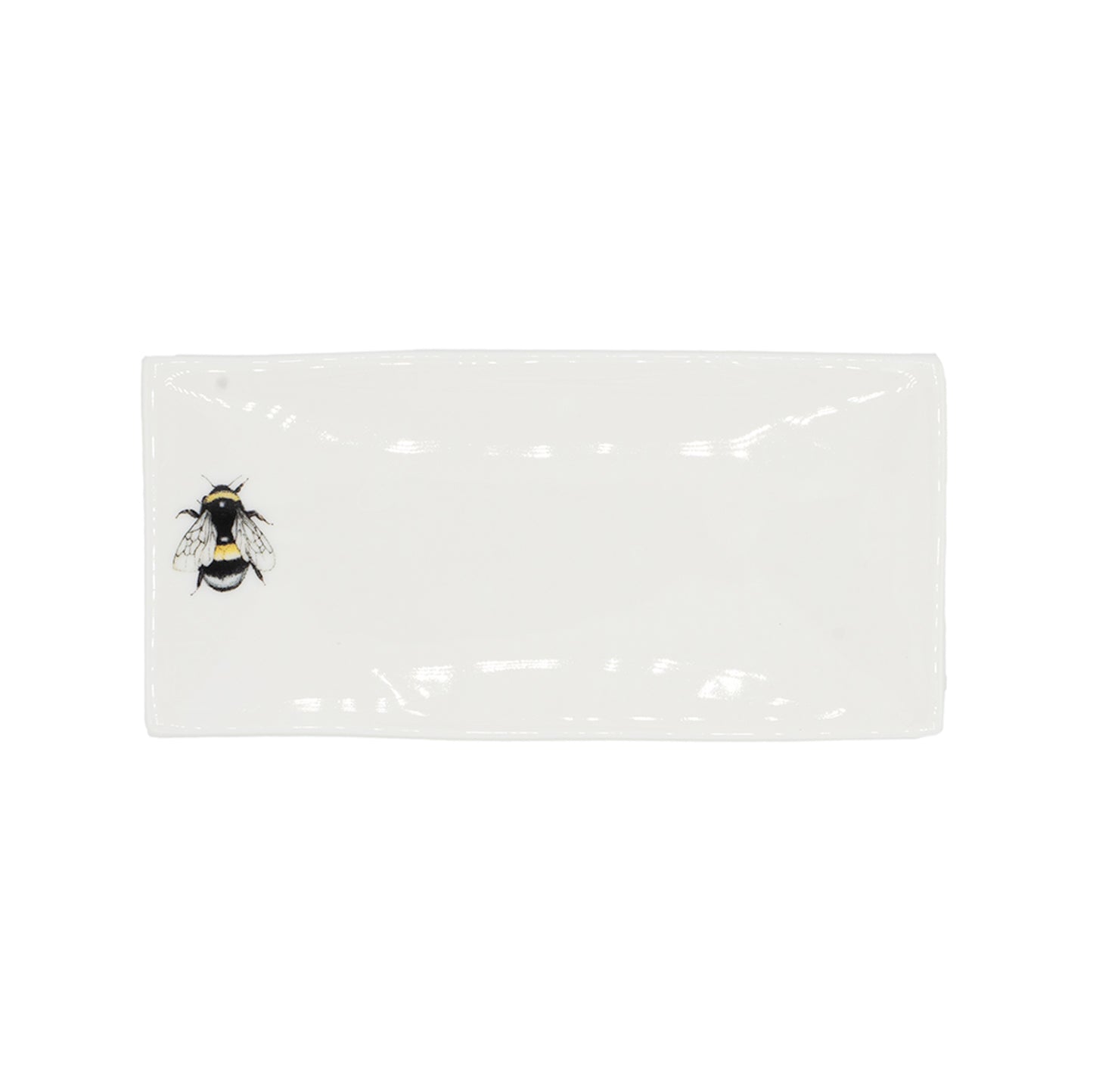 Rectangular soap dish with a picture of a bee on it. Photographed against white background.