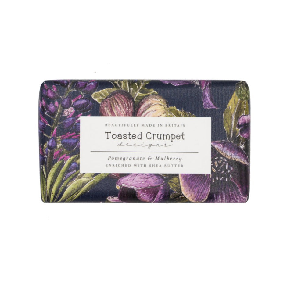 Rectangular soap in purple, black and green floral packaging with Toasted Crumpet branded label. Photographed against a white background.