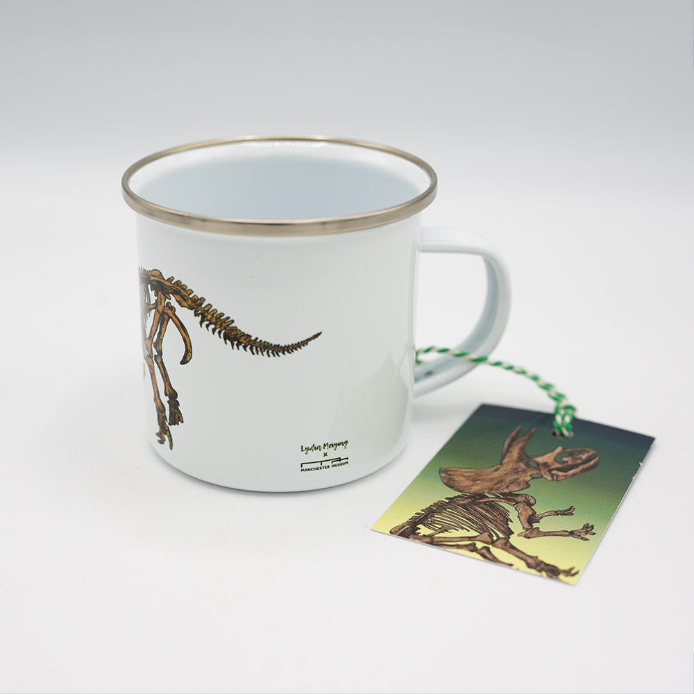 Mug with dinosaur skeleton design and matching card on a white background