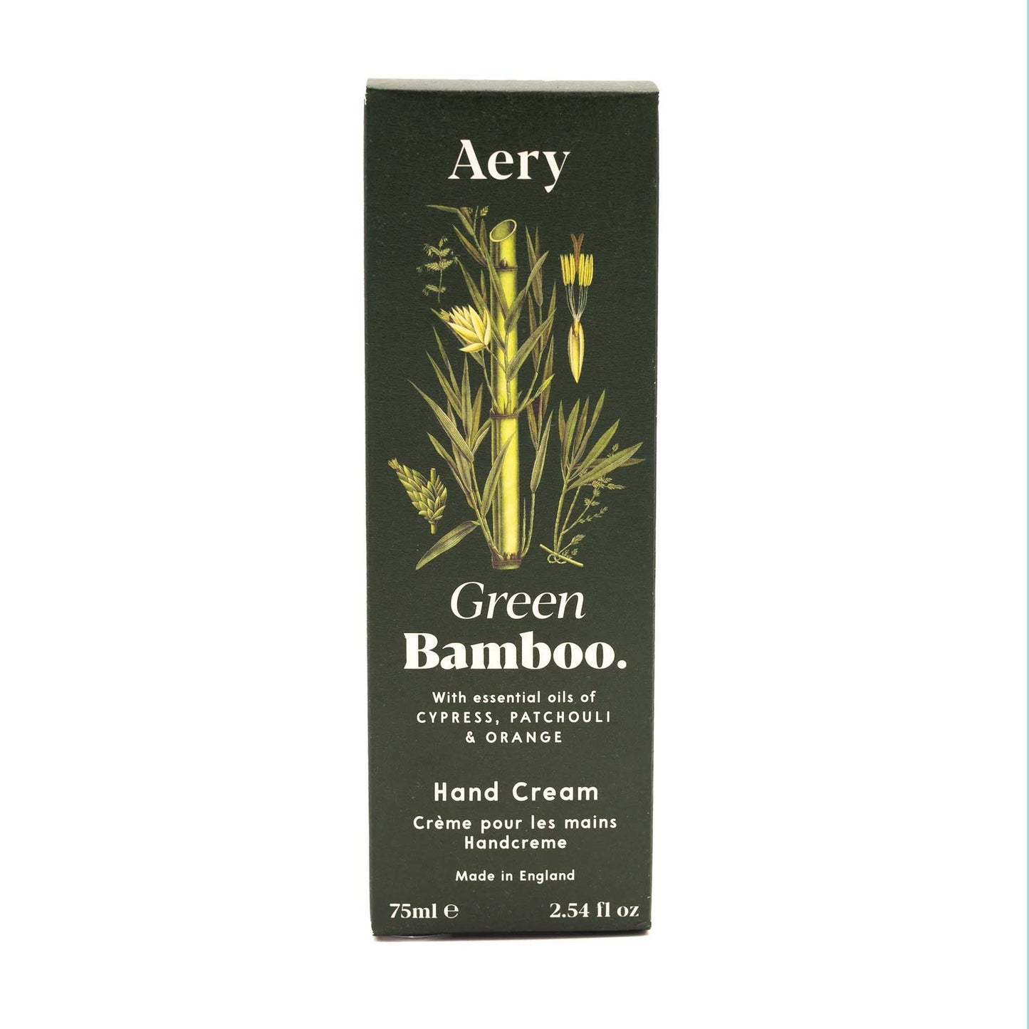 The dark green boc the hand cream arrives in. An illustrated bamboo is taking up a third of the box while white text reads, aery, green bambo, hand cream.