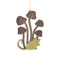 Small bronze mouse at the bottom of five brown mushrooms of varying height with the tallest in the middle from which the gold ribbon hangs.