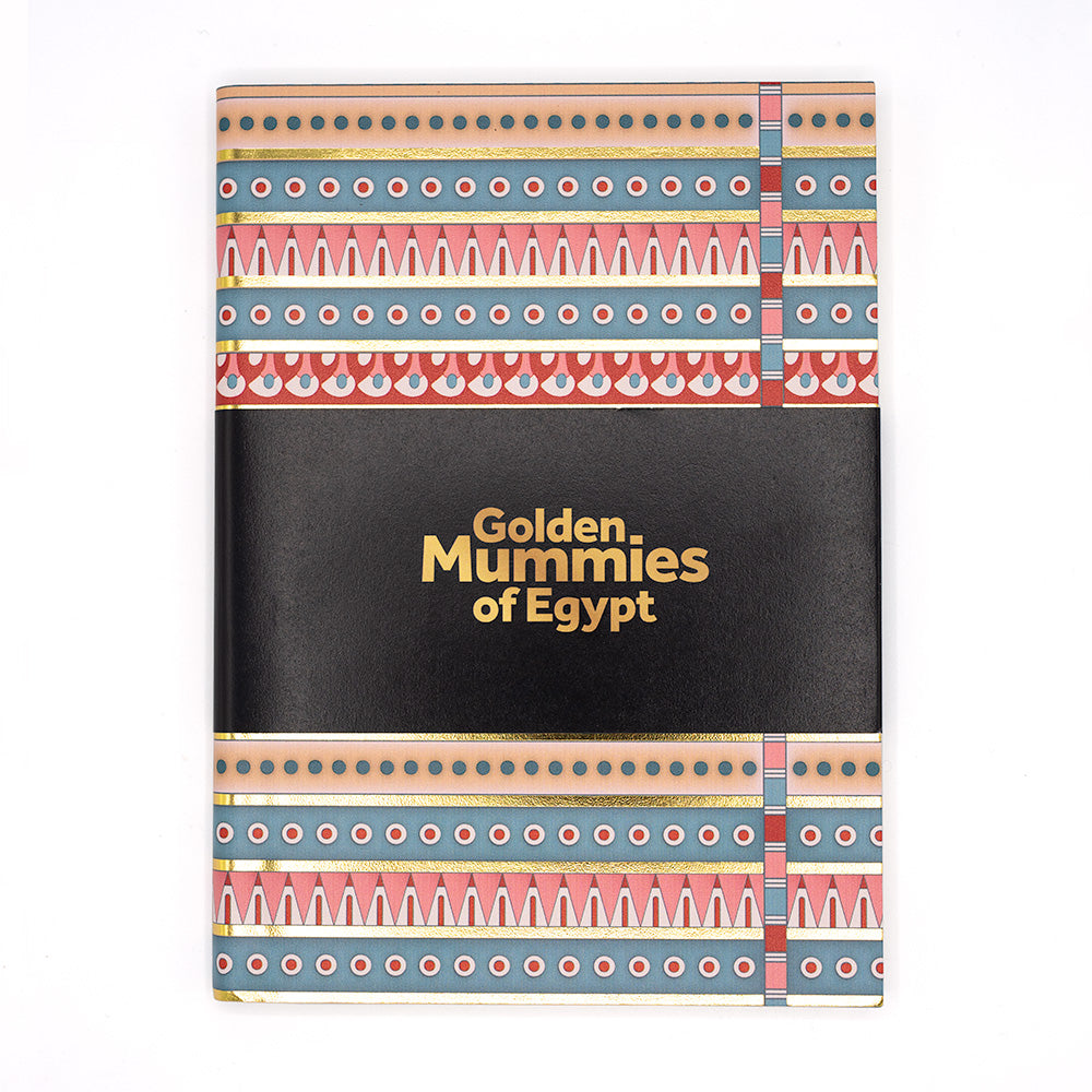 The patterned notebook with a black belly band with the text, Golden Mummies of Egypt.