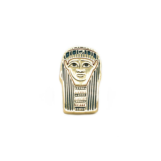 Golden pin with blue engravings shown against a white background.