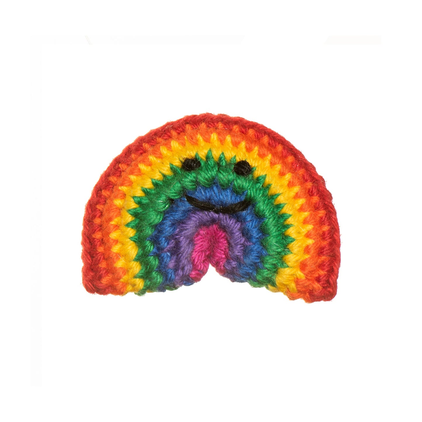 Crochet rainbow brooch with a little smiley face in black thread.