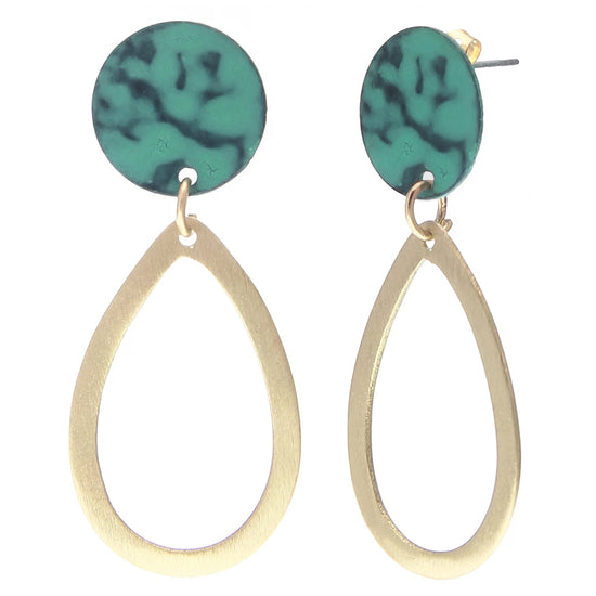 A pair of round stud earrings in dark teal with outline brass drop shaped pendants attached beneath.