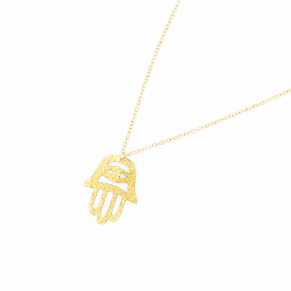 Fatima hand brass necklace with the chain vanishing off the image to the right.