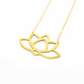 Brass Lotus statement necklace close up.