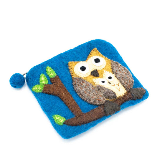 Blue felt purse with a branch and owl with a baby owl in front of it sitting on the branch.